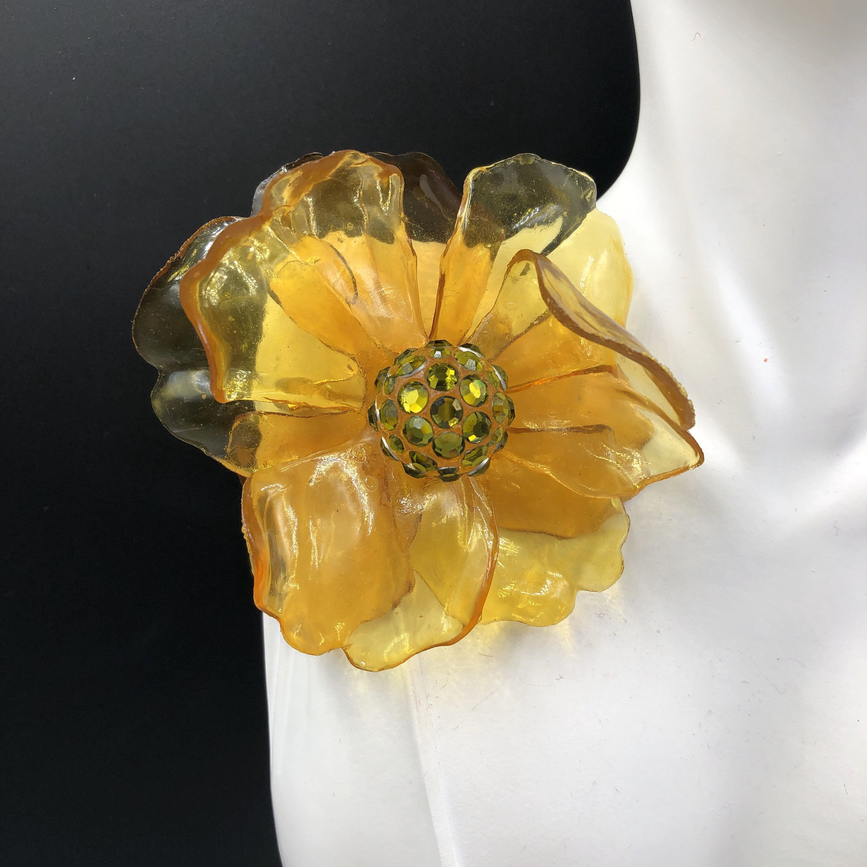 Yellow brooch on sale