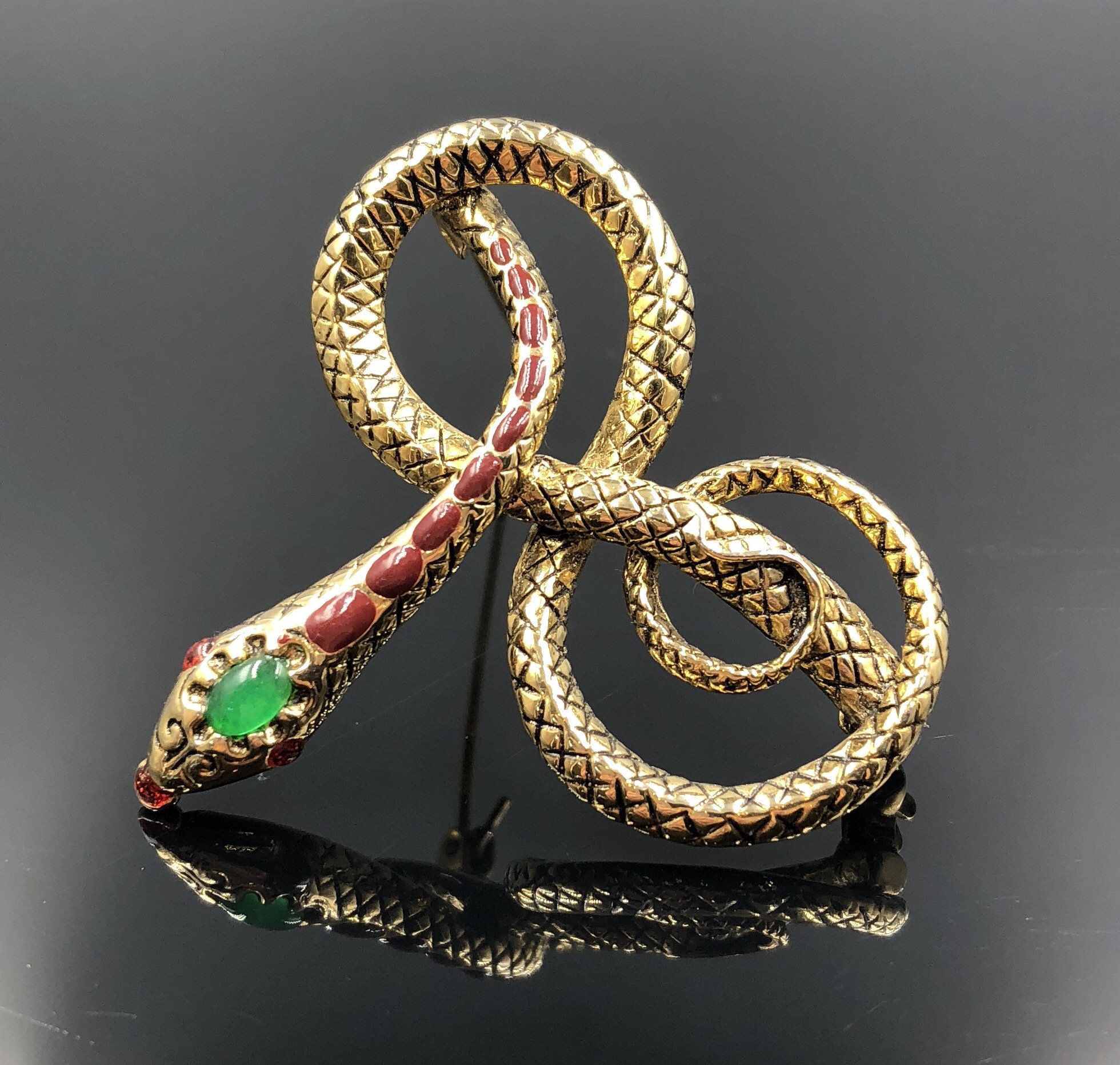 cassandre snake brooch in metal